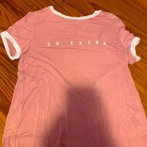 This is a pink tee shirt from Charlotte Russe.